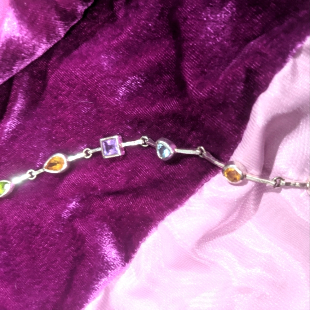 Gemstone topaz amethyst other,  and sterling bracelet.